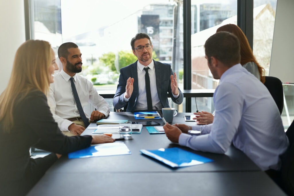 Finance, investor or business people in meeting with group for feedback and discussion or teamwork. Corporate review, financial or professional colleagues talking for news, advice and planning online.
